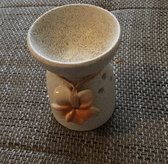 Geurbrander met oranje bloem