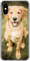 Geschikt voor iPhone X hoesje - Een portret van een Golden Retriever puppy in de tuin - Siliconen Telefoonhoesje
