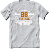 28 Jaar Legend T-Shirt | Goud - Wit | Grappig Verjaardag en Feest Cadeau Shirt | Dames - Heren - Unisex | Tshirt Kleding Kado | - Licht Grijs - Gemaleerd - S