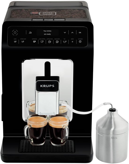 Zwarte Krups volautomatische espressomachine met twee glazen espresso en melkreservoir.