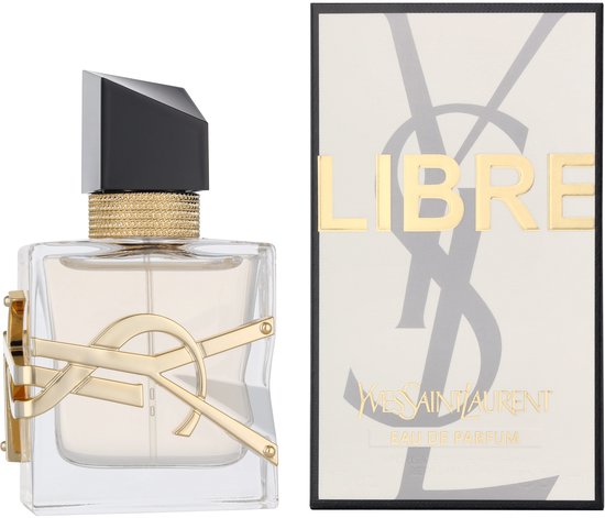 Parfumfles naast de bijpassende doos met YSL logo.
