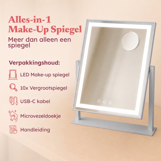 Zilverkleurige make-up spiegel met verlichting en 10x vergrotingsspiegel, inclusief accessoires.