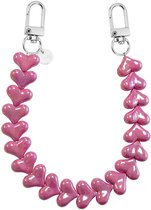 xoxo Wildhearts telefoonkoord - Funky Hearts - metaal fuchia - Geschikt voor iPhone - Geschikt voor Samsung - Universeel Phone Cord - Telefoonketting - Bedeltje voor telefoon - Telefoonhanger - kralenketting - Ketting met hartjes - Metaal fuchia