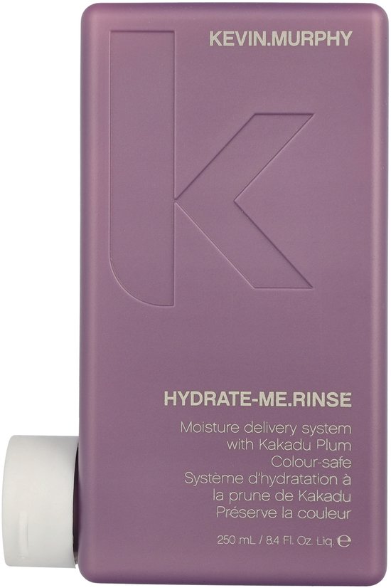 KEVIN.MURPHY Hydrate-Me.Rinse après-shampoing dans une bouteille violette mate avec le texte 'Moisture delivery system with Kakadu Plum Colour-safe'.