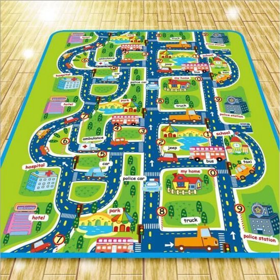 Groene speelmat met een stadsplattegrond met auto's, bussen, taxi's, ziekenhuizen en parken.