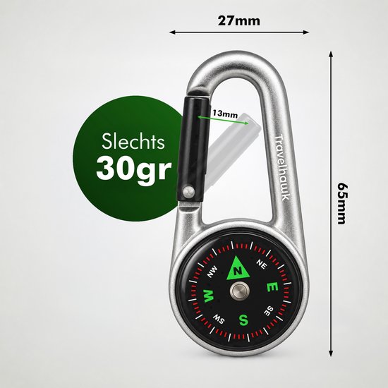Zilverkleurige Travelhawk karabijnhaak met kompas en afmetingen van 27mm bij 65mm. Tekst: Slechts 30gr.