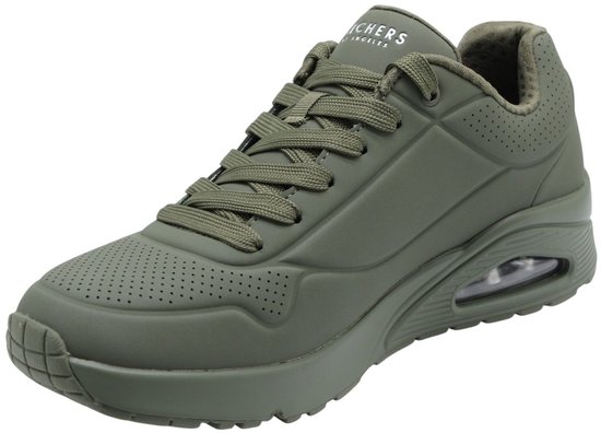 Sneaker Skechers verte à lacets, logo sur le côté et amorti d'air visible.