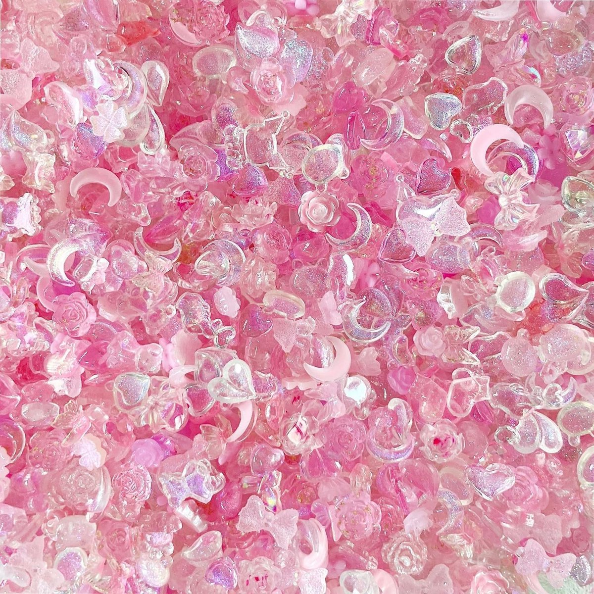 150 rhinestone nagelkunst versieringen, betoverende accessoires voor nagelkunst, roze harten, strikken en dolfijnvormen voor creatieve DIY projecten en telefoonhoesjes.