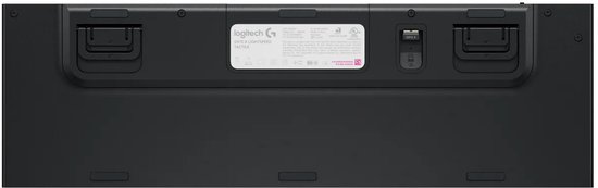 Onderkant van het zwarte Logitech G915 X toetsenbord met verstelbare pootjes en USB-ontvangercompartiment.