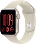 Apple Watch met starlight aluminium behuizing en starlight sportbandje, tonend tijd 10:09 en activiteitsringen.