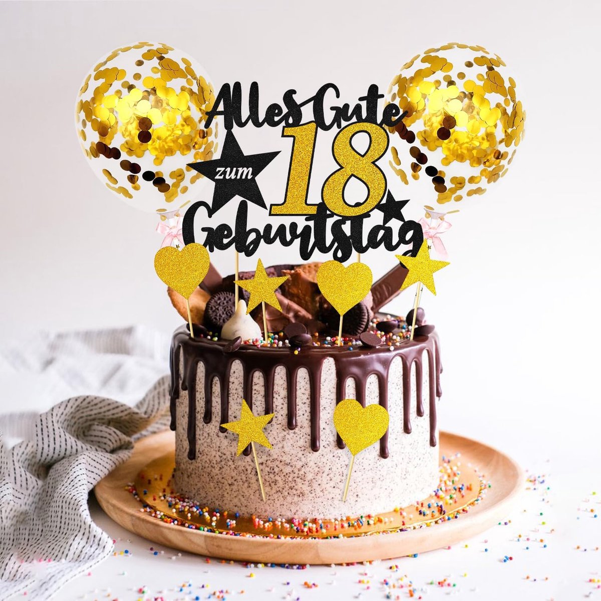 Taartdecoratie voor 18e verjaardag in zwart goud