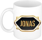 Jonas naam cadeau mok / beker met gouden embleem - kado verjaardag/ vaderdag/ pensioen/ geslaagd/ bedankt