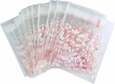 Fako Bijoux® - 100x Transparante Uitdeelzakjes - Cellofaan Plastic Traktatie Kado Zakjes - Snoepzakjes - Hartjes Mini - 7x7cm