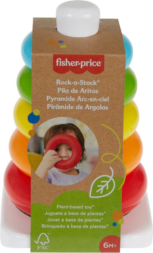 Verpakking van Fisher-Price Rock-a-Stack met vijf gekleurde ringen. Een kind houdt een ring voor zijn gezicht op de verpakking.