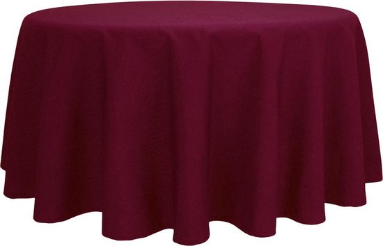Rond bordeaux tafelkleed op een tafel