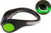 Zwarte schoenklem met groene LED-ring en aan/uit-knop.