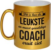 Dit is hoe de leukste en meest geweldige coach eruitziet cadeau koffiemok / theebeker - goudkleurig - 330 ml - verjaardag / bedankje - cadeau trainer / trainster