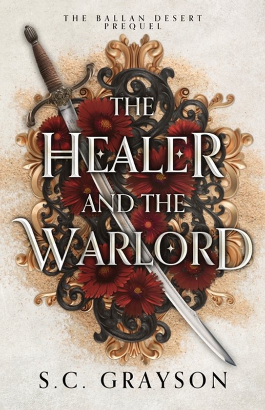 Boekomslag: 'The Healer and the Warlord' met zwaard, bloemen en gouden ornamenten op zand.