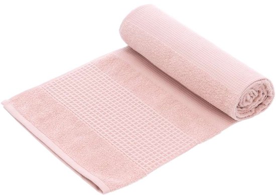 Rol de lichtroze Vossen yogamat handdoek met wafelpatroon en zachte rand.
