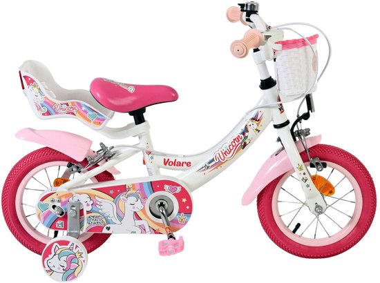 Witte kinderfiets met roze banden, mandje, poppenzitje en unicorn-opdruk.