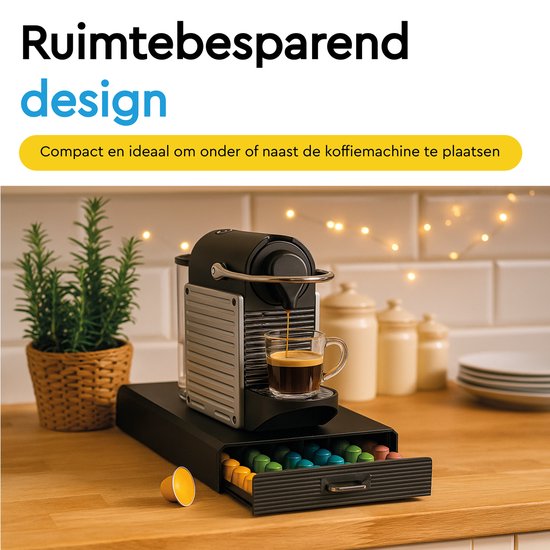 Boîte noire pour capsules, tiroir ouvert rempli de capsules colorées sous une machine Nespresso sur un comptoir.