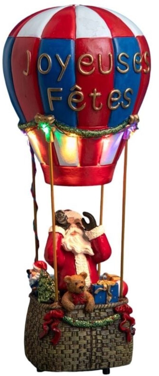 Kristmar Kerstman in luchtballon - Kerstfiguur voor kerstdorp - Kerstdecoratie met LED - L12.6xB12.6xH29.5 cm - Werkt op batterijen (Niet inbegrepen) - Polyresin - Meerkleurig