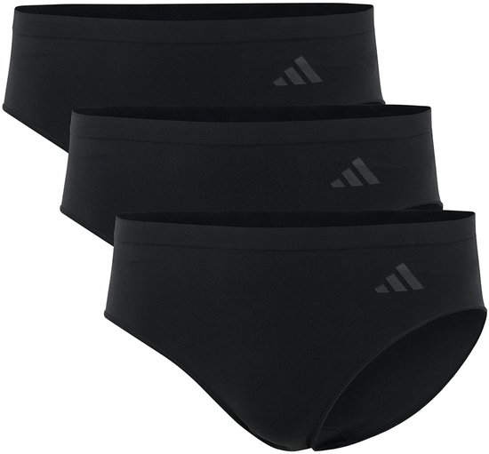 Trois slips noirs alignés, chacun avec un logo Adidas foncé sur la hanche gauche. Finition sans couture.