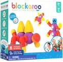 Een Blockaroo doos met paarse, oranje, gele en blauwe magnetische bouwstenen in de vorm van een spin, robot en vliegend object.