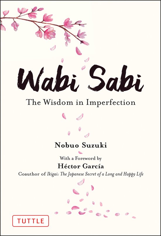 Boek "Wabi Sabi: The Wisdom in Imperfection" van Nobuo Suzuki, met bloesemtak en vallende bloesemblaadjes.