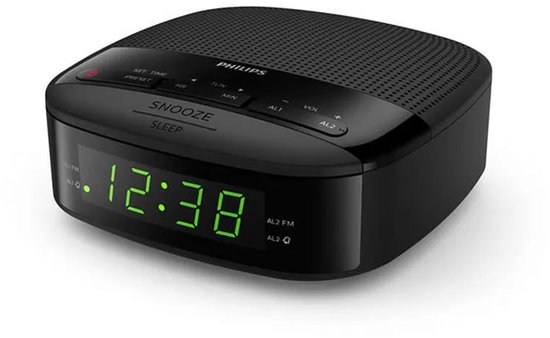 Zwarte digitale Philips wekkerradio met groene weergave van 12:38.