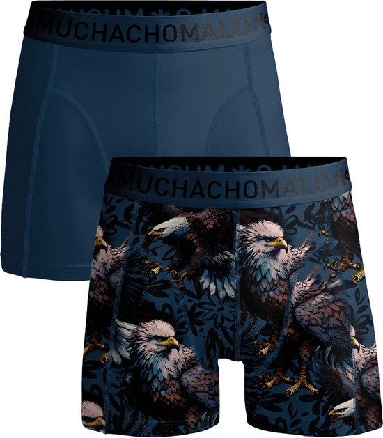 Twee Muchachomalo boxershorts. Eén effen donkerblauwe en één met adelaarsprint op donkerblauwe achtergrond.