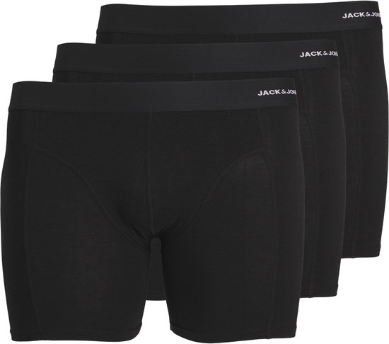 Drie zwarte boxershorts, schuin van voren gezien, met elastische band.