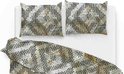 Housse de couette et taies d'oreiller avec un motif géométrique vert, beige et noir. Ressemble à un filet de pêche.