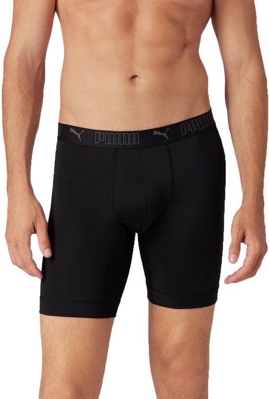 Man die zwarte Puma boxershorts met logo-elastische band draagt.