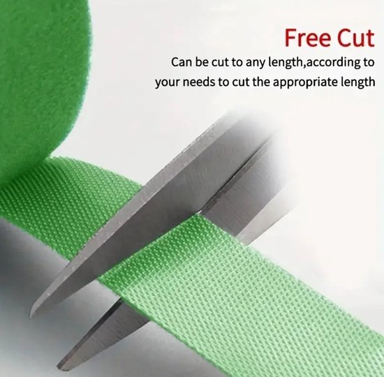 Een schaar knipt door een rol groen klittenband. Tekst: 'Free Cut', 'Kan naar elke lengte worden geknipt'.
