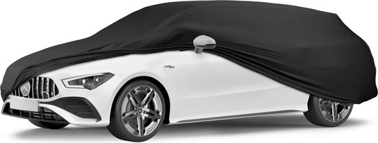 Zwarte Walser autoverdekking (Indoor Stretch Basic) op een witte auto, getoond vanaf de voorkant.