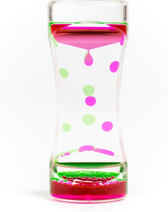Een zandloper gevuld met vloeistof, met roze en groene druppels en balletjes die naar beneden zakken in een heldere, zandloper-vormige behuizing.
