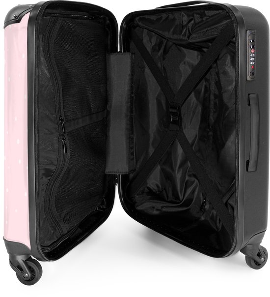 Valise noire ouverte avec côté rose à pois, compartiment en filet, sangles et serrure à combinaison.