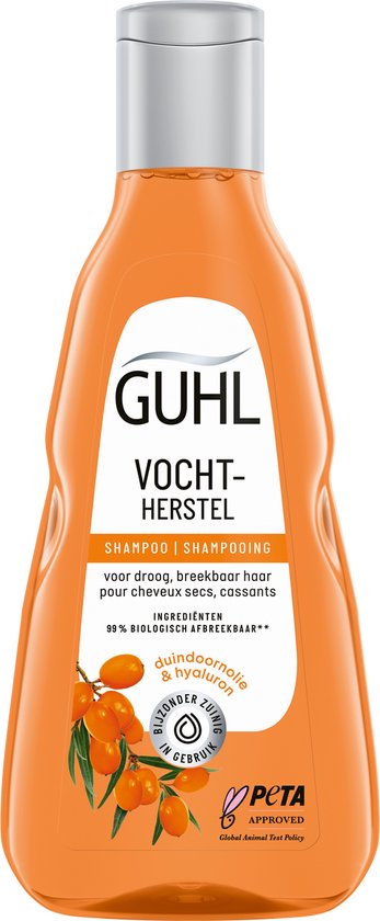 Guhl Vochtherstel shampoo fles in oranje met witte dop. Label met tekst 'Vochtherstel' en afbeelding van duindoornbessen.