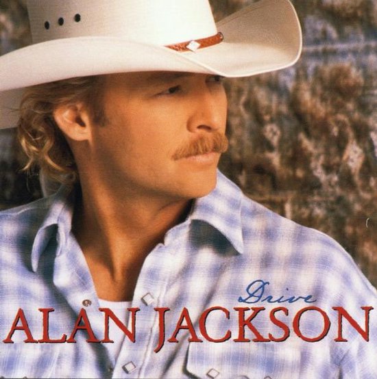Alan Jackson met witte cowboyhoed en blauw geruit overhemd.