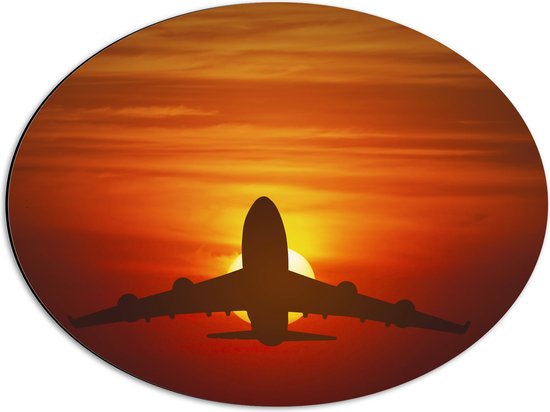 Dibond Ovaal - Silhouet van Vliegtuig tegen Feloranje Zon in Roodkleurige Lucht - 56x42 cm Foto op Ovaal (Met Ophangsysteem)