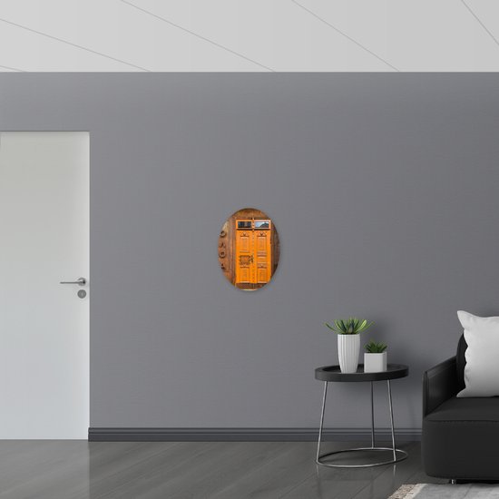 Dibond Ovaal - Gebouw met Oranje Deur - 42x56 cm Foto op Ovaal (Met Ophangsysteem)