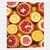 Muursticker - Achtergrond van Bloedsinasappels, Sinaasppels en granaatappel - 60x80 cm Foto op Muursticker