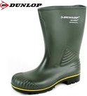 Groene Dunlop Acifort laars met versterkte geribbelde neus, gele rand en zwart profiel.