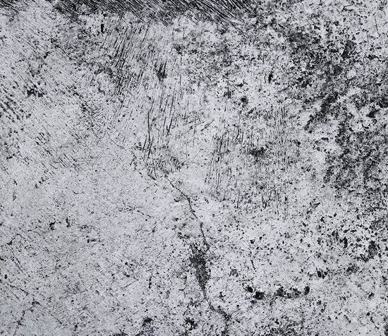 Grijze betontafel met metalen poten Grijze betontafel met metalen poten
