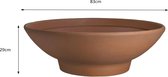 Zandkleurige, brede kom met afmetingen van 83cm breed en 29cm hoog.