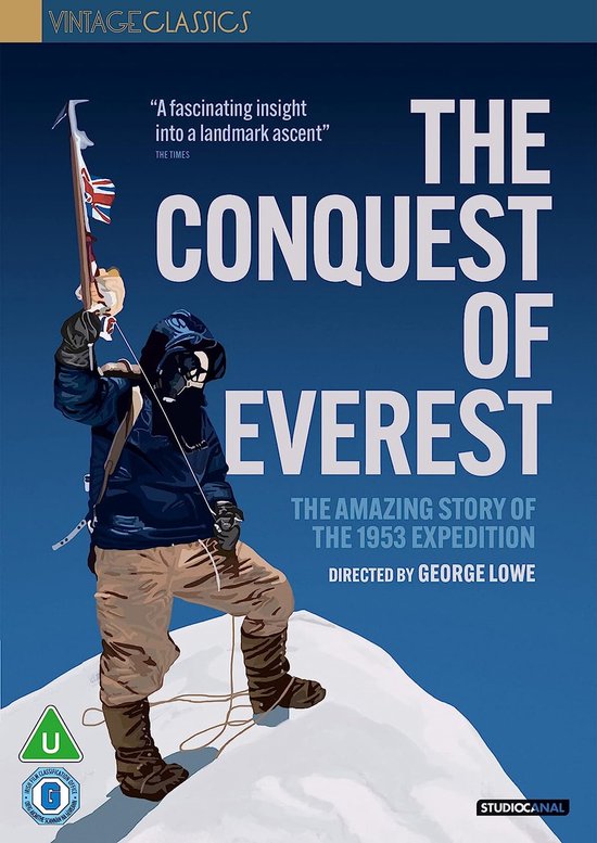 Een man in bergbeklimmerskleding met ijshamer op een besneeuwde bergtop. De titel 'THE CONQUEST OF EVEREST'.