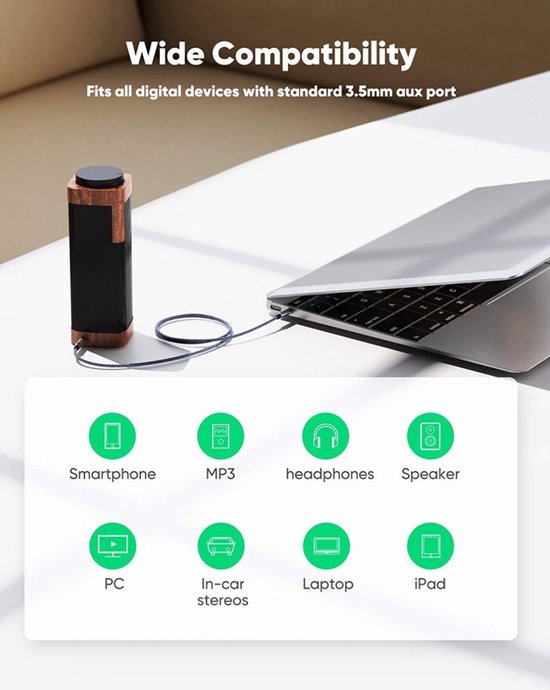 Câble tressé gris connecté entre un haut-parleur et un ordinateur portable, avec des icônes d'appareils compatibles.