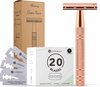 Rose gold safety razor met gekarteld handvat, naast een doos met 20 scheermesjes.