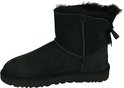 Zwarte UGG mini laars met strik op de achterkant en grijze schapenvacht voering.